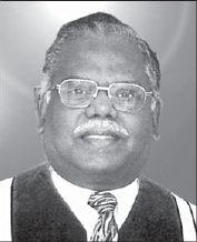 Photograph from page 3 of Dr. Vijaya Sudha