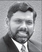 Photograph from page 4 of Dr. Vijaya Sudha