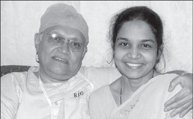 Photograph from page 6 of Dr. Vijaya Sudha